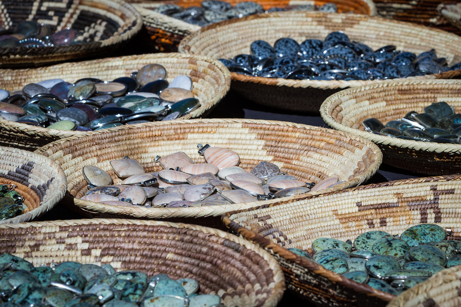 Baskets of hand made colorful crafts at the Santa Fe Market