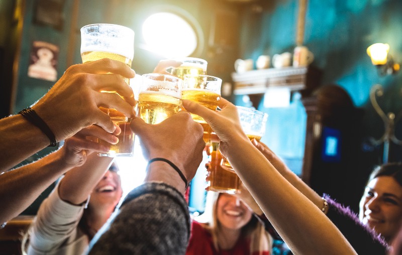 drinking and cheers in group setting