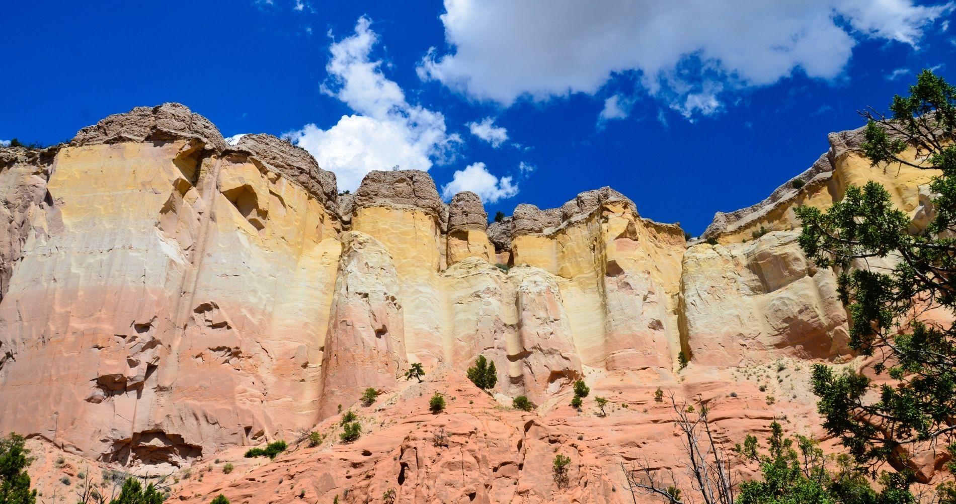 Beautiful mountains in New Mexico, painted-like pastel colors against a brilliant blue sky