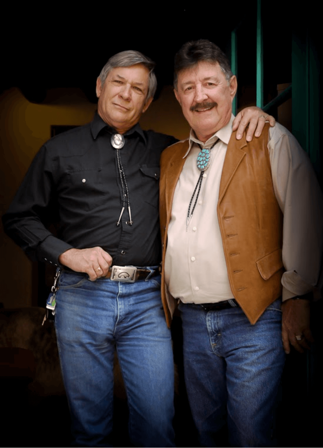 Robert Frost and Richard Bolton standing together wearing western clothing