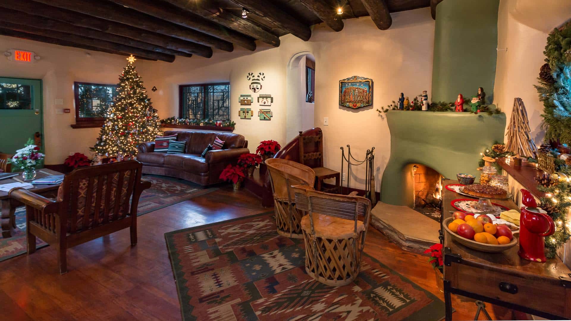 Inn living room decorated for Christmas with Christmas Tree