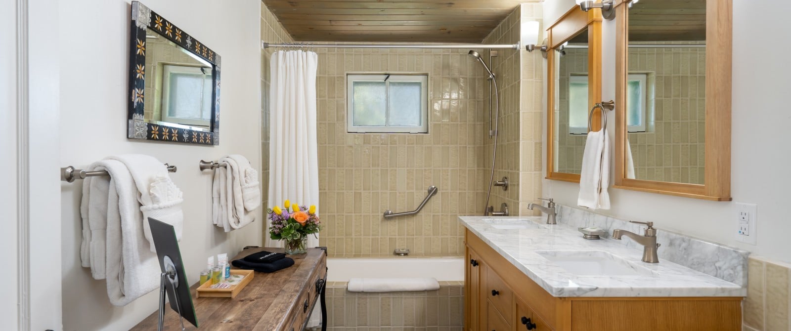 soaking tub, shower, and double vanity in Georgia O'Keeffe guest room bathroom