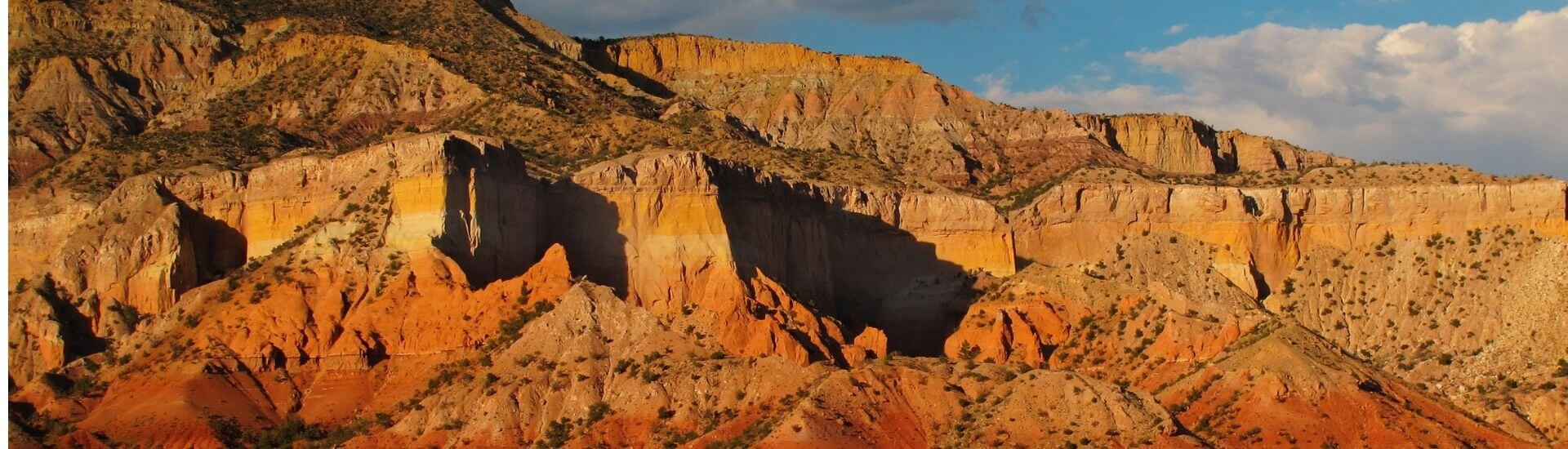 Sun reflecting on painted desert in New Mexico's O'Keeffe Country