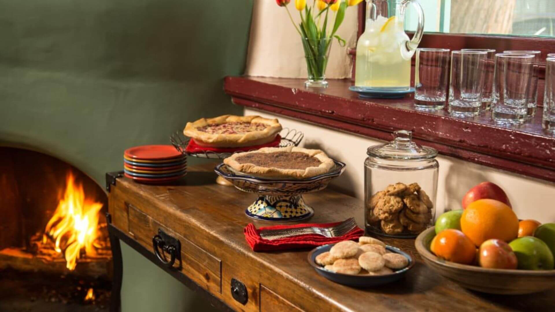 Afternoon treats and pies displayed on sideboard