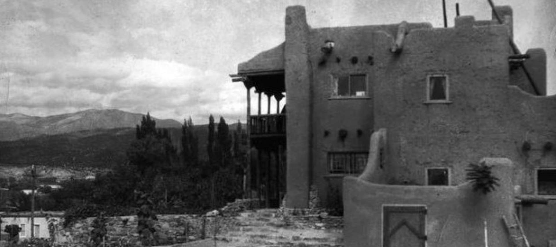 Historical version of the exterior view of the Inn of the Turquoise Bear property