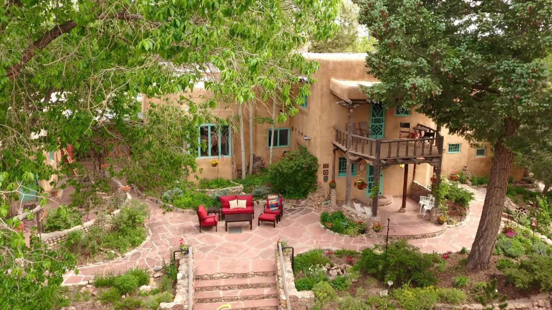 Aerial view of Inn of the Turquoise Bear courtyard and adobe exterior in Santa Fe