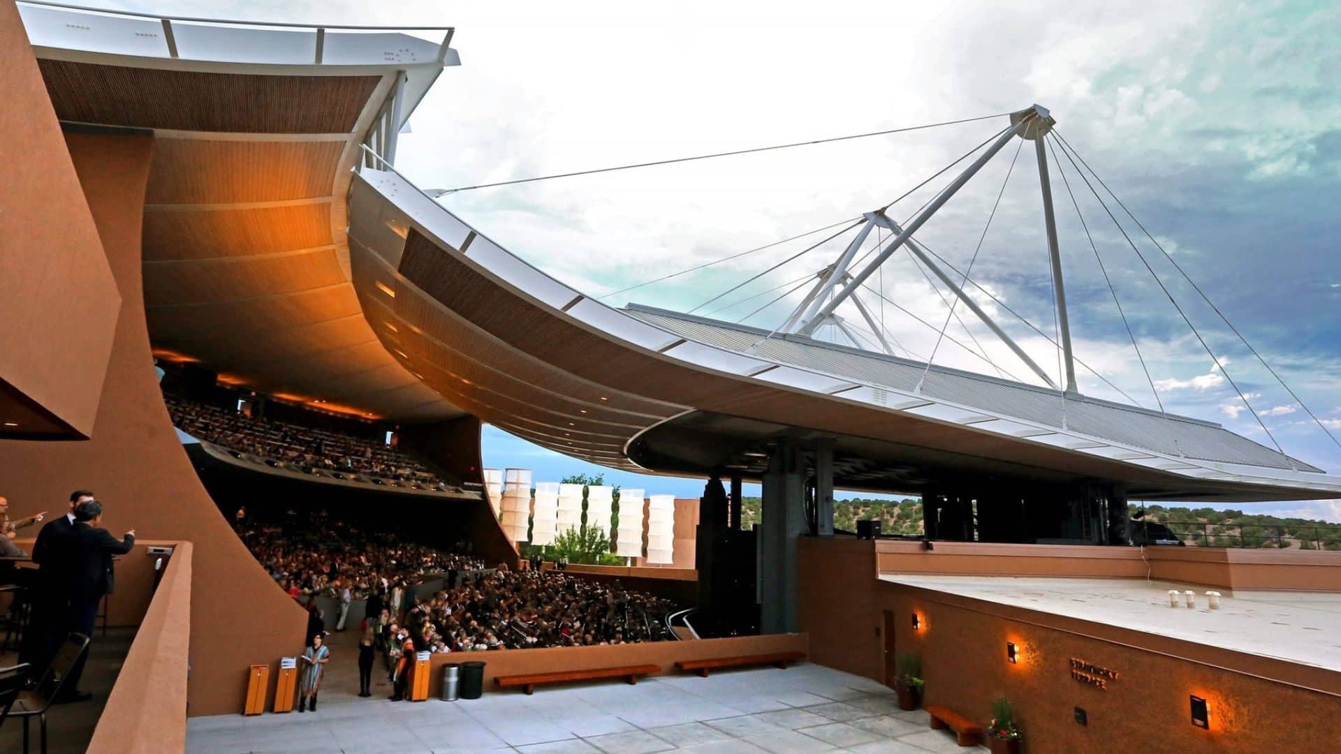 Close-up view of the unique Santa Fe Opera building with curved and sloping ceiling. Photo by Robert Godwin