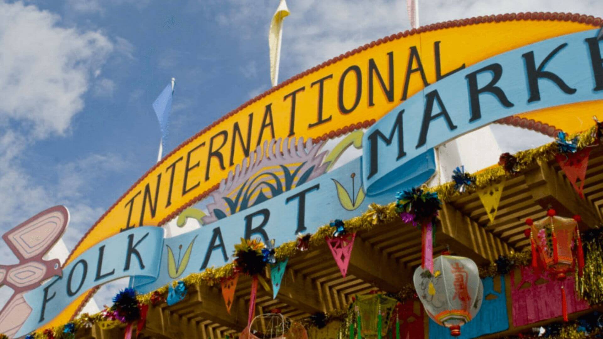 view of the international folk art market sign