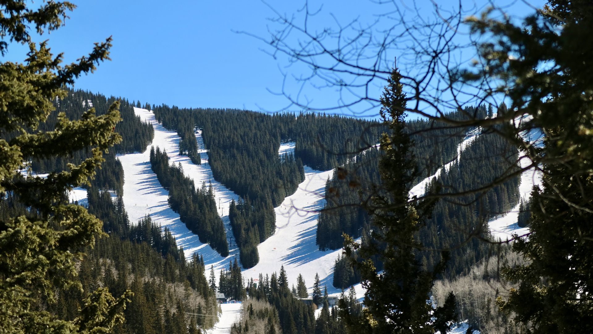 View of mountains with snow in the valleys