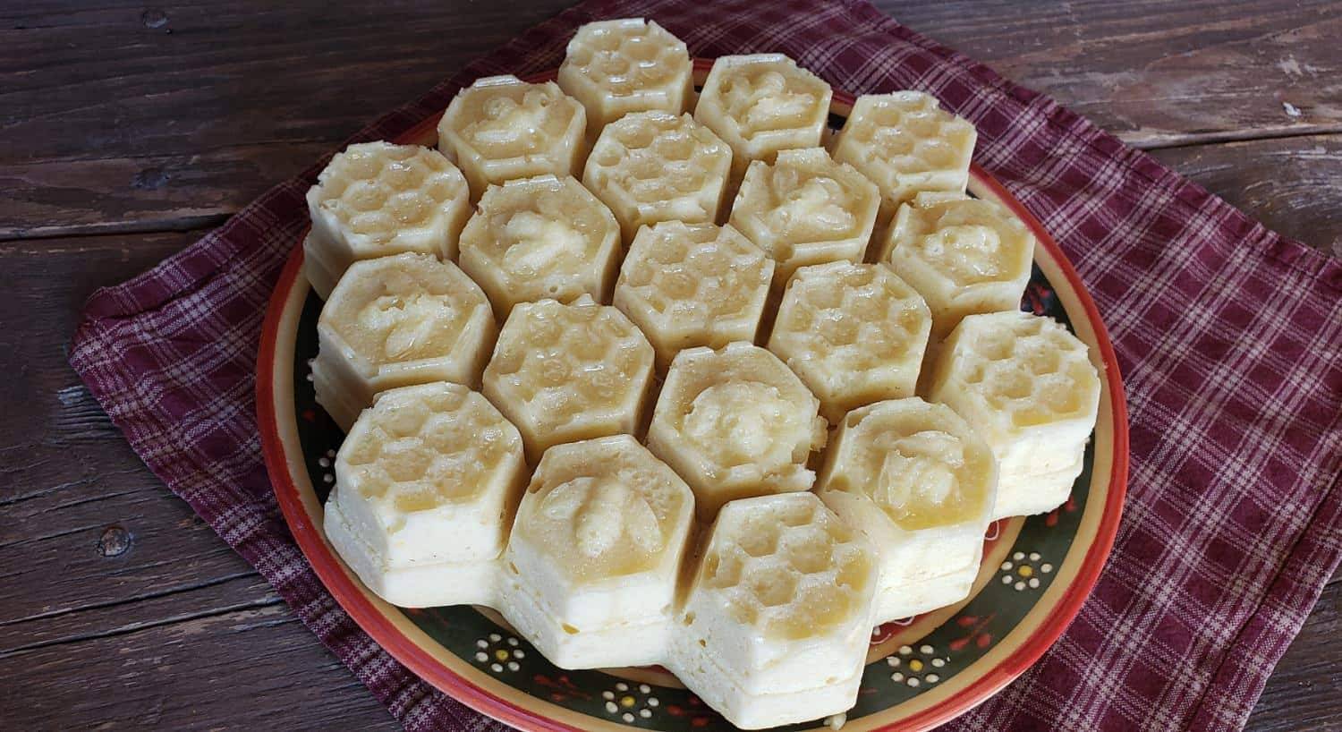 Close up view of a dessert in the shape of honeycomb