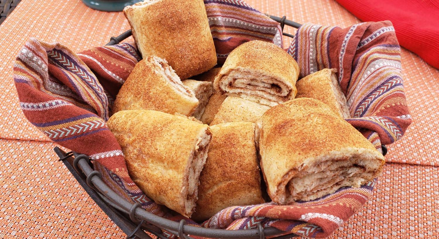 Close up view of basket with cinnamon bread